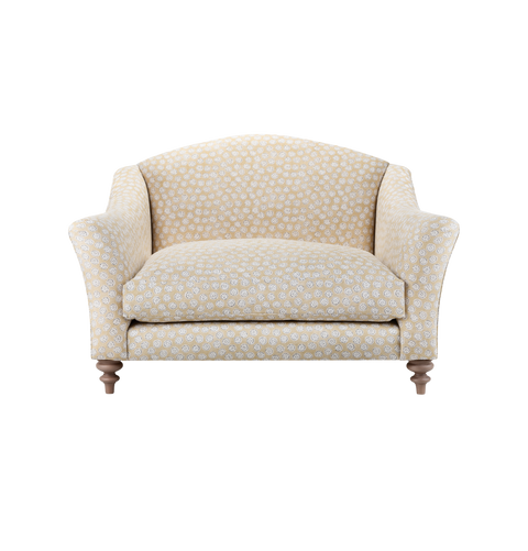 Glamorous Lounging with Orla Sofa's Sweeping Arm Design